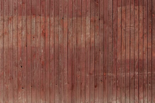 Old vintage wooden wall with color peeling paint for background.