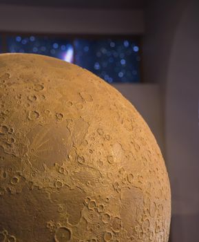 big model of moon in an observatory