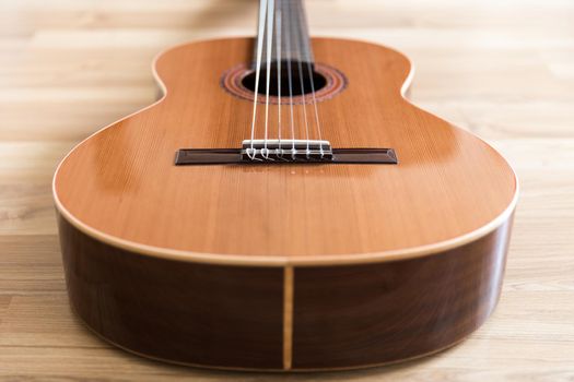 A classical guitar with six nylon strings