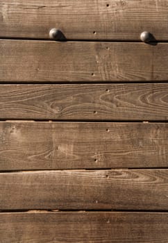 Old vintage wooden wall with color peeling paint for background.