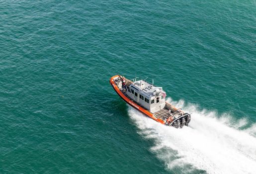 MIAMI, USA - SEPTEMBER 06, 2014 : Coast guard boat near Miami port on September 06, 2014 in Miami.