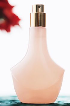 Vintage pink and gold perfume bottle, beauty and cosmetics concept