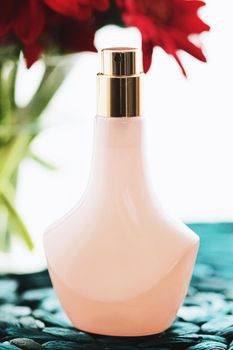 Vintage pink and gold perfume bottle, beauty and cosmetics concept