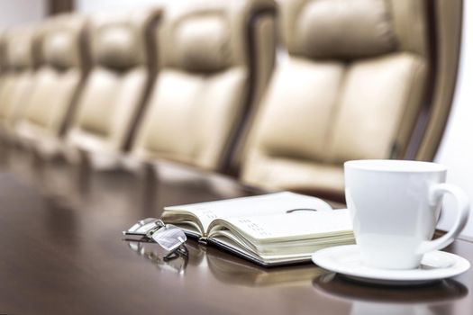 Business papers in conference room before meeting in office