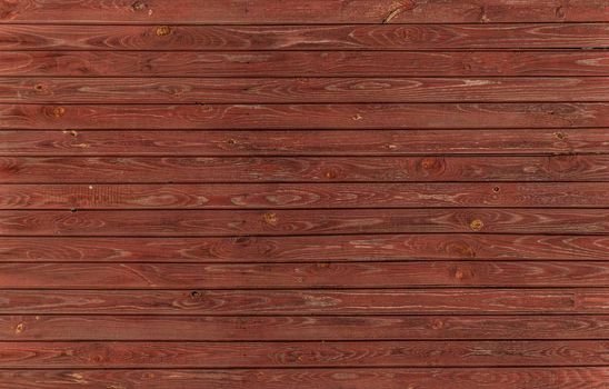 Old vintage wooden wall with color peeling paint for background.