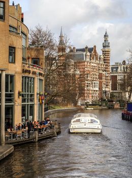AMSTERDAM, NETHERLANDS - MARCH 15: Streets of the city with canals, on March 15, 2014 in Amsterdam
