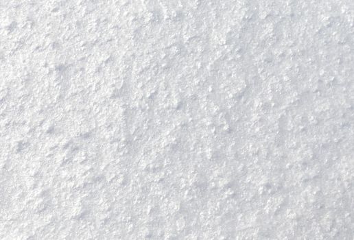 a background of fresh pure snow, white crystal surface