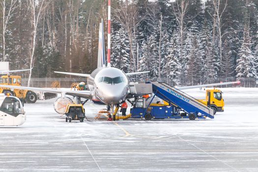 MOSCOW, RUSSIA - DECEMBER 06, 2016 : Airplane parking in SHEREMETYEVO airport on December 06.2016 in Moscow