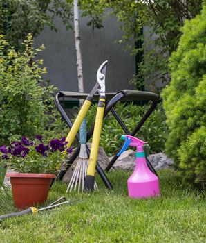 Some garden tools on a green tool