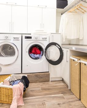 Laundry room with basket and dirty clothes