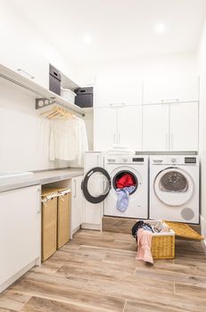 Laundry room with basket and dirty clothes