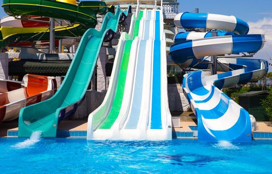 ANTALIA, TURKEY - MAY 11, 2014: Colorful waterpark tubes and a swimming pool in Delphin Imperial hotel on MAY 11, 2014 in Antalia.