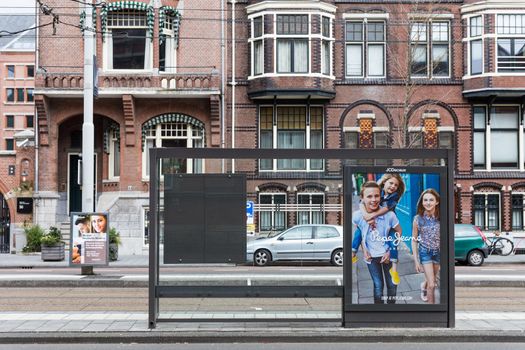 Blank billboard on a roadside in european town