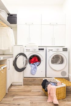 Laundry room with basket and dirty clothes