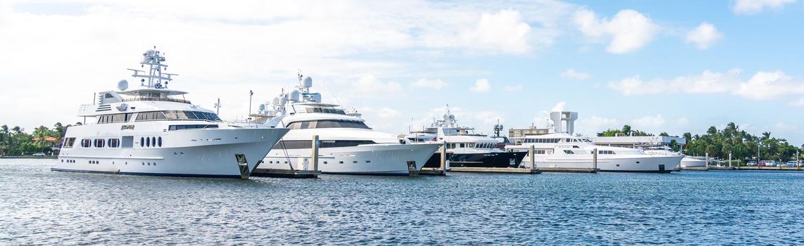 Fort Lauderdale, Florida, USA - September 20, 2019: Luxury yachts docked in marina in Fort Lauderdale
