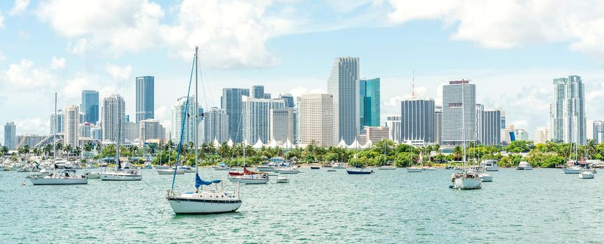 Miami, USA - September 11, 2019: Yachts in Biscayne Bay with Miami Skyline