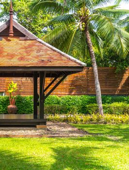 beautiful wooden gazebo in tropical nature