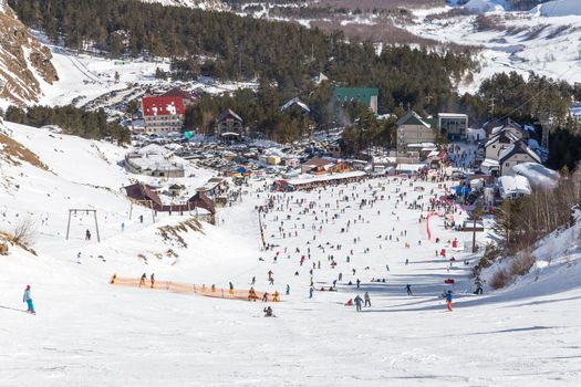 AZAU, RUSSIA - FERUARY 22: A lot of people skiing at Elbrus mountain, on February 22, 2015, Azau, Russia.