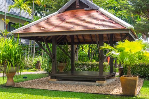 beautiful wooden gazebo in tropical nature