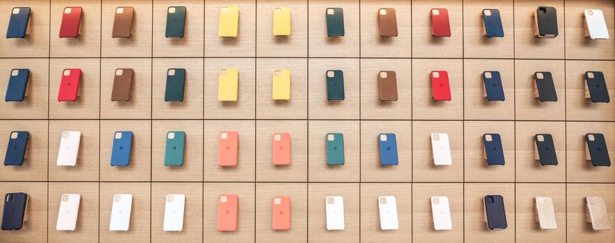 AVENTURA, FLORIDA, USA - SEPTEMBER 20, 2019: Apple iphone 11 series protection cases hanging on the wall in Apple store in the Aventura Mall