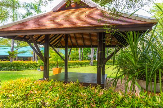 beautiful wooden gazebo in tropical nature