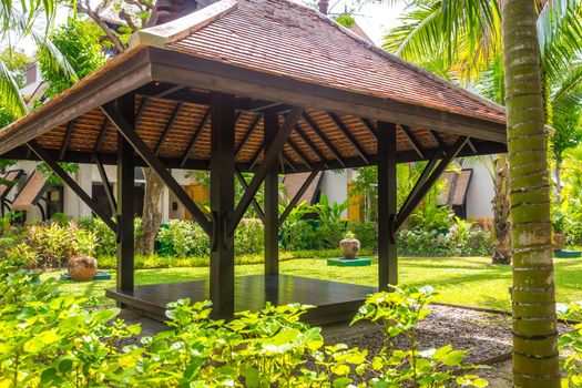 beautiful wooden gazebo in tropical nature