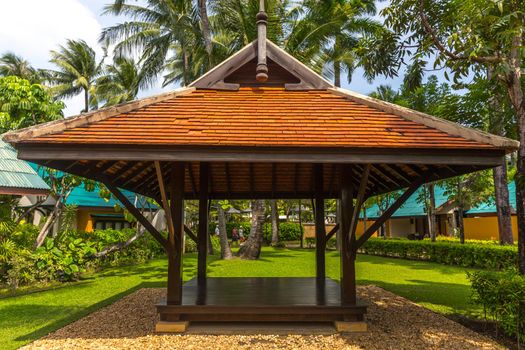 beautiful wooden gazebo in tropical nature