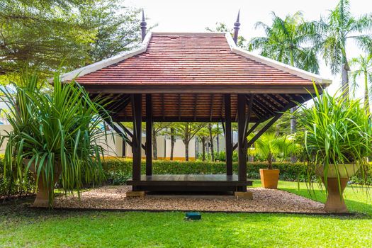 beautiful wooden gazebo in tropical nature