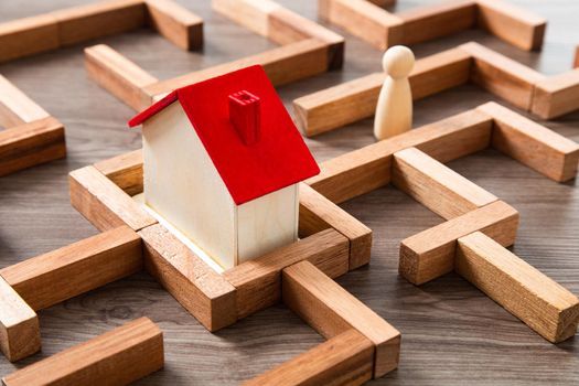 real estate concept, wooden house with maze