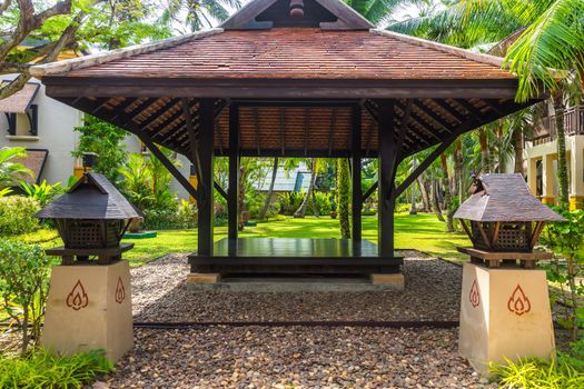 beautiful wooden gazebo in tropical nature