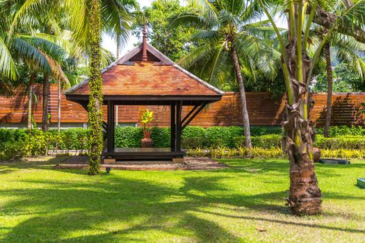 beautiful wooden gazebo in tropical nature