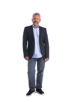 Confident mature businessman standing full length isolated on white background