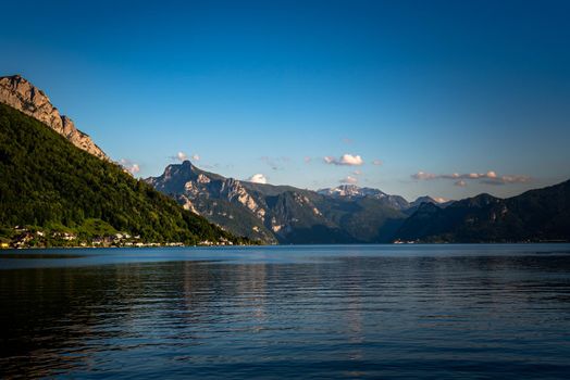 Panoramic view of Traunsee lake during sunset, landscape photo of lake and mountains near Gmunden, Austria