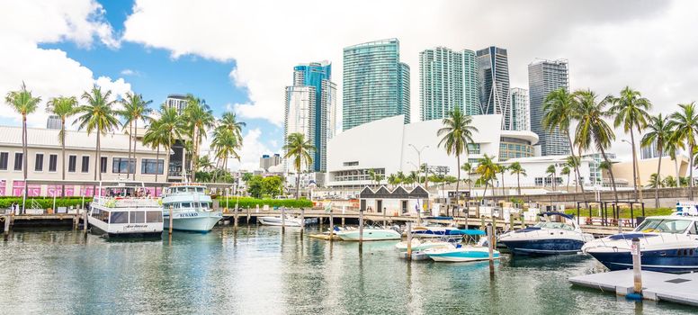 Miami, USA - September 11, 2019: View of the Marina in Miami Bayside with modern buildings and skyline in background