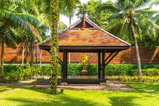 beautiful wooden gazebo in tropical nature