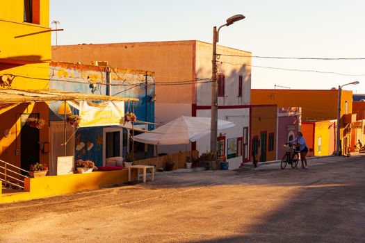 Linosa, Italy - July, 23: View of the Linosa houses at sunset in the summer season. Linosa is one of the Pelagie Islands in the Sicily Channel of the Mediterranean Sea on July 23, 2021