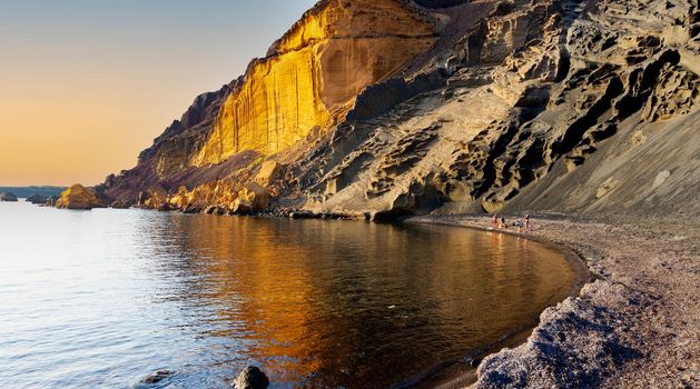 View of the Linosa volcano called Monte Nero in the beach of Cala Pozzolana di Ponente, Sicily