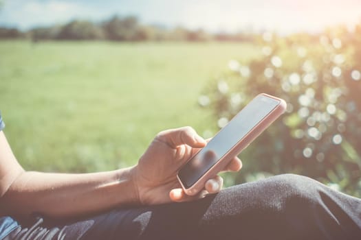 Woman hand using smartphone to do work business, social network, communication concept.