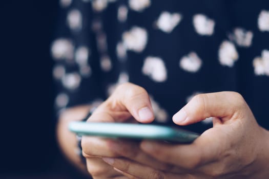 Woman hand using smartphone to do work business, social network, communication concept.