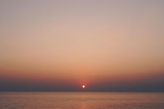 Tropical nature clean beach sunset sky time with sun light background.