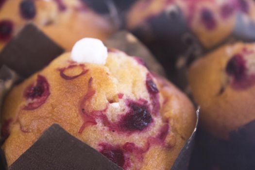 Muffins with strawberry syrup. No people