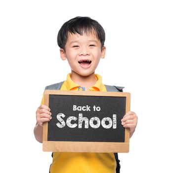 Young asian boy smile holding BACK TO SHCOOL chalkboard over white