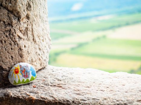 Devicky castle ruin, Czechia. 29th of August 2021.  The picture painted on a stone is part of a children's tourist game. Devicky ruin window, Pavlov region. South Moravia, Czechia