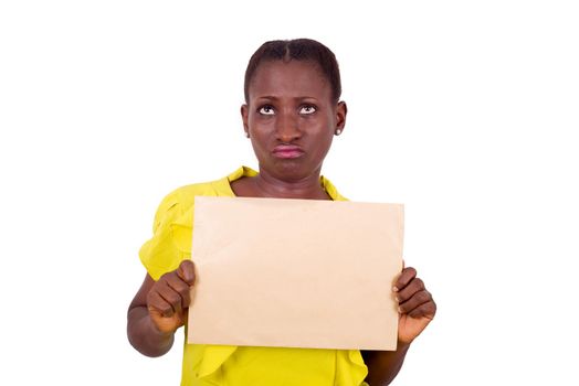 young pensive and worried woman and holding a blank sheet of paper, looking up to solve a problem in studio on a white background