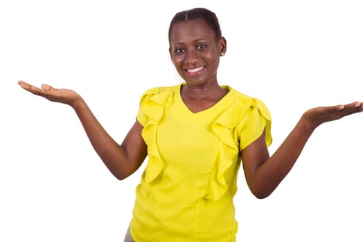 Happy and surprised business woman showing product holding hand to the side.