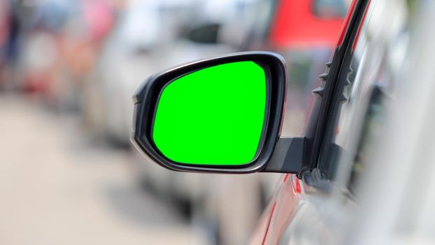 green screen , side view mirror car in rush hour traffic
