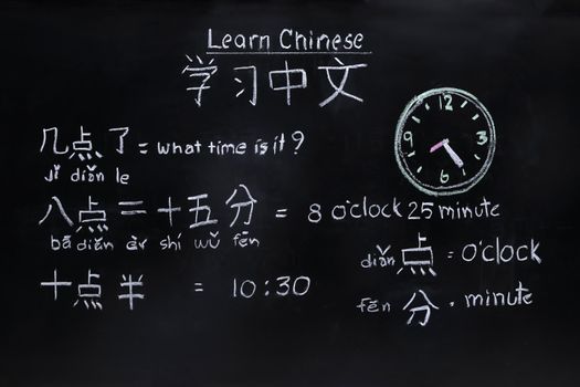 Learning chinese to tell time in class room.