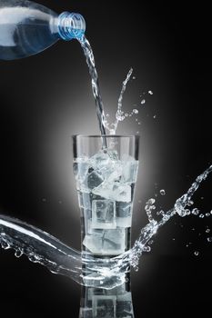 drinking water,on dark background