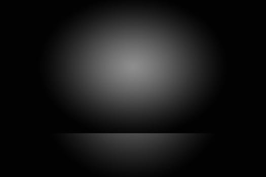 Abstract luxury blur dark grey and black gradient, used as background studio wall for display your products