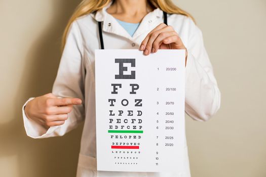 Image of female doctor doing eye exam.